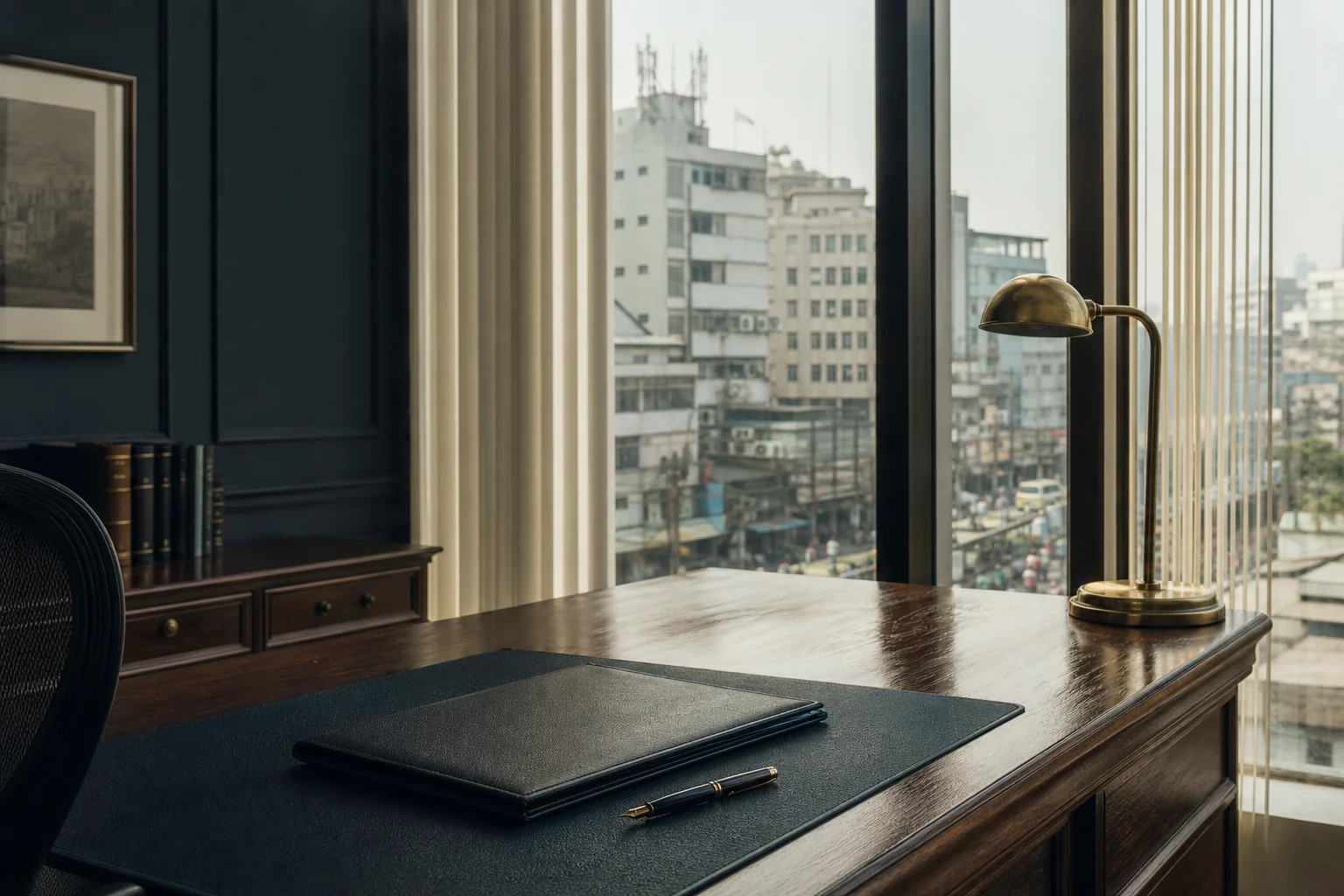 Proposal atmosphere: a Dhaka office desk looking onto the city. Not a photograph of the firm’s premises.